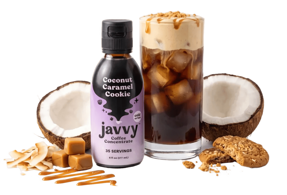 Javvy Coconut Caramel Cookie Coffee Concentrate and an iced coffee next to coconut, caramels and cookies