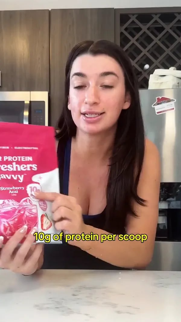 Customer trying the Strawberry Açaí Protein Refresher