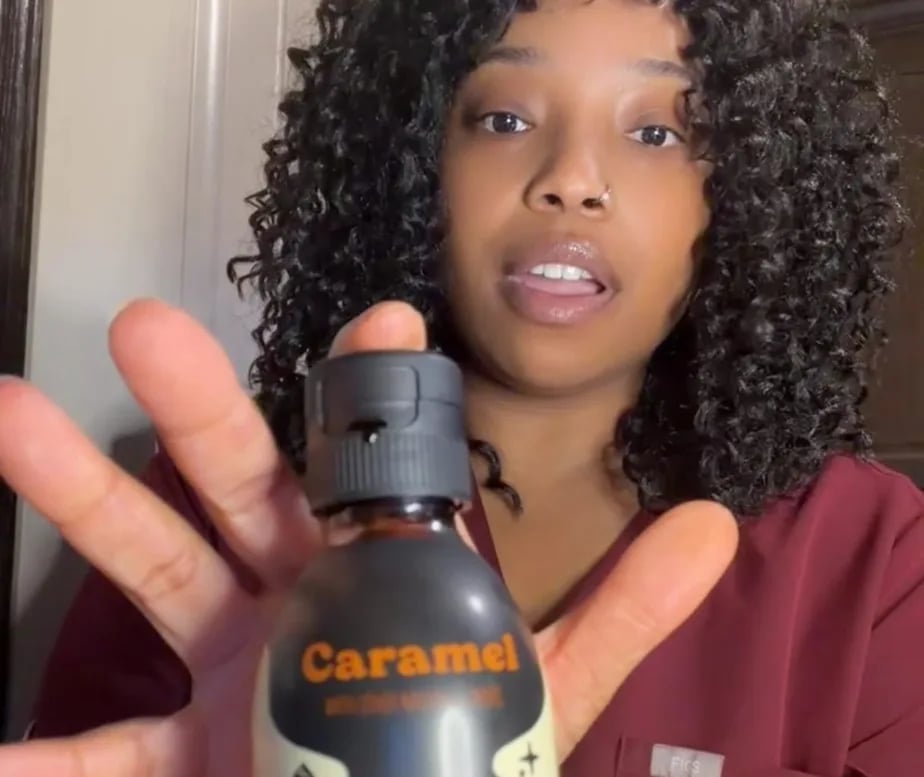 Customer showing a bottle of Caramel Coffee Concentrate